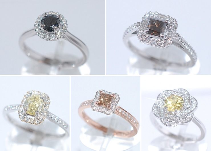 Fancy coloured diamond halo rings.