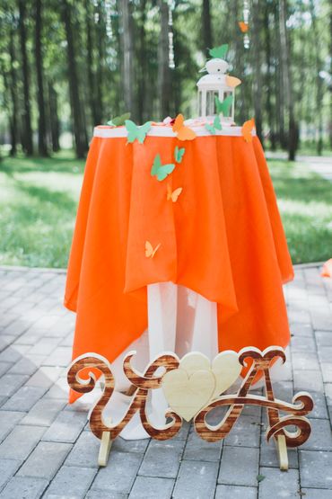 Orange wedding ceremony decor