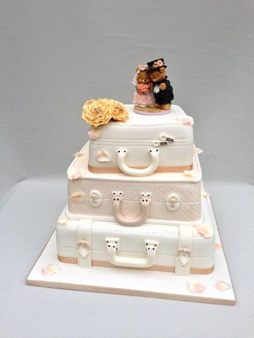 Themed white wedding cakes