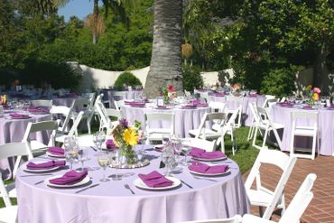Outdoor purple wedding reception decor