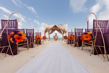 Beach orange wedding ceremony decor