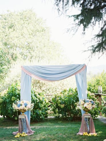 Outdoor blue wedding ceremony decor
