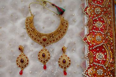 Red bracelets, earrings, necklaces & other jewellery