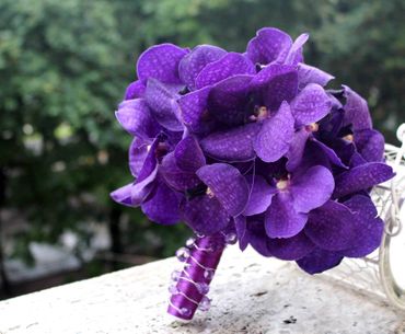 Purple orchid wedding bouquet