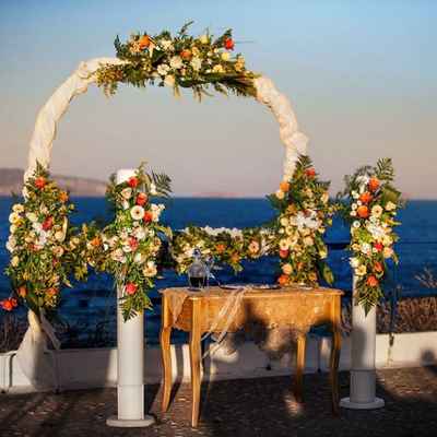 White beach wedding ceremony decor