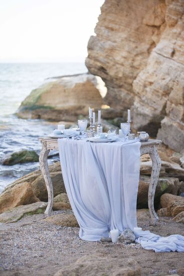 Blue beach wedding photo session decor