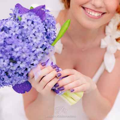 Purple orchid wedding bouquet